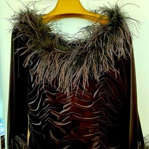Black velvet ruched top with ostrich feathers.